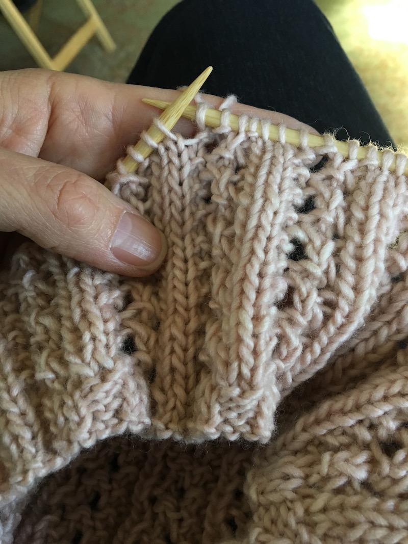 double lace rib knit pattern of messy bun hat